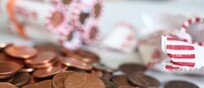 Pennies are seen on a table